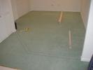 Marking the carpet for removal.