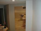 The sheetrock is up on the new wall