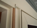 The new storm door, shim detail.