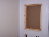 The hole where the medicine cabinet was